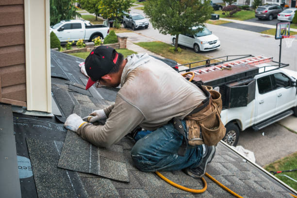 Professional Roof Repair technician working in Woxall, PA